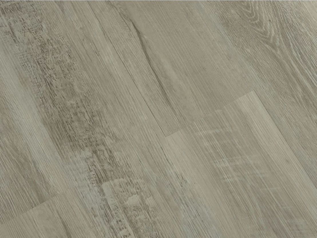 Dentine SPC vinyl flooring, angled close-up of the grain and plank joints.