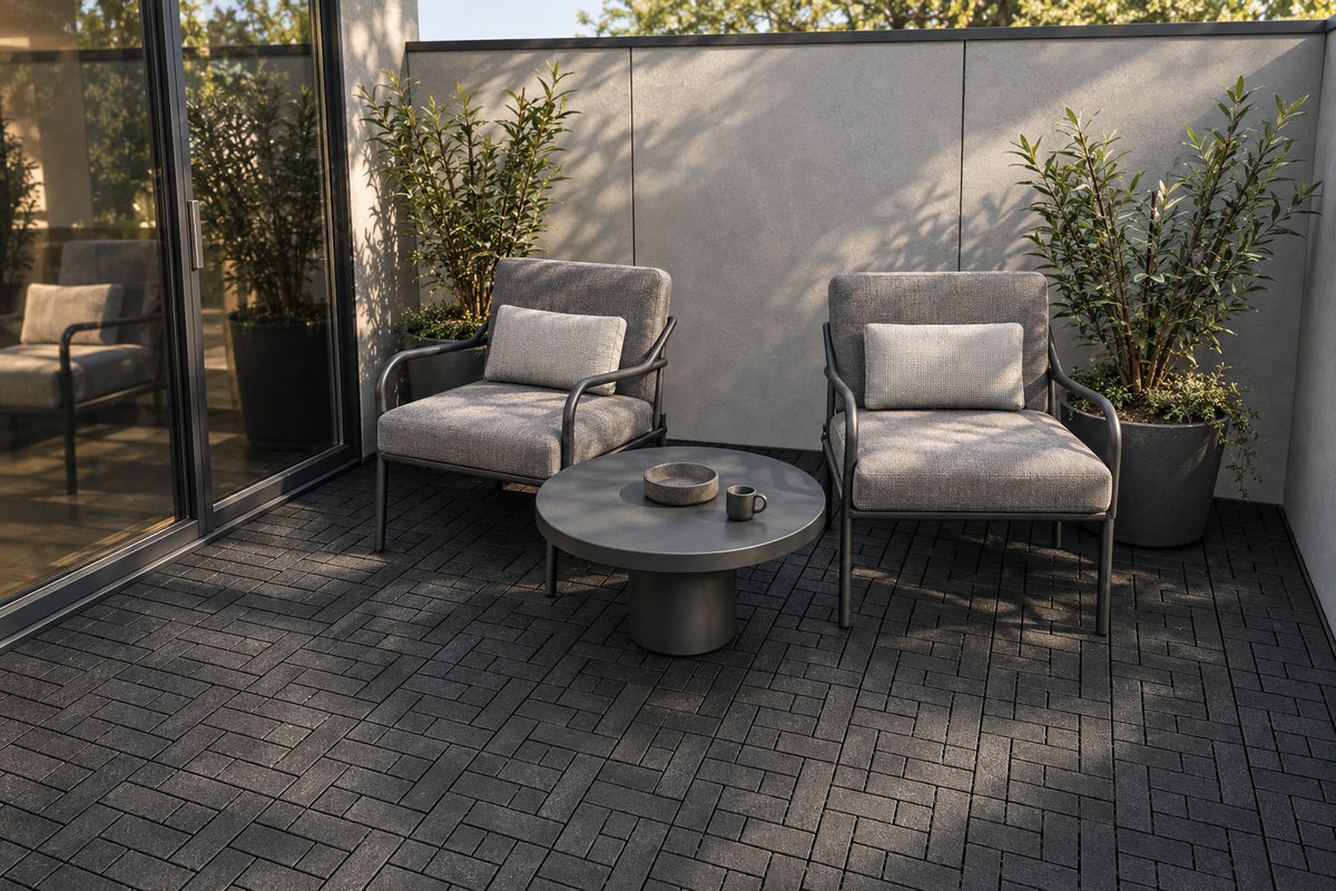 Black interlocking composite deck tiles in a private balcony; AI installation visualization guided by the product’s 3D tile model.