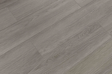 Mink SPC vinyl flooring, angled close-up of the grain and plank joints.