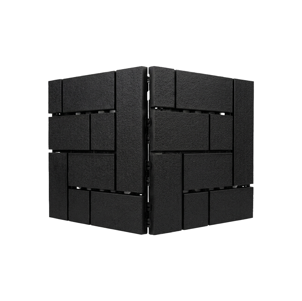 Angled product view of black interlocking composite deck tiles.