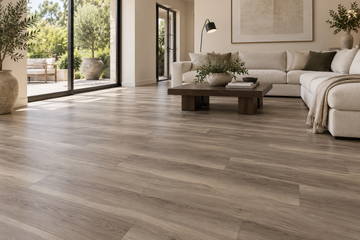 Driftwood Shore SPC Vinyl Flooring — TFSPC8609-F — daytime living room. AI interior visualization based on original supplier finish photos.