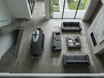Everest SPC vinyl flooring, overhead view of an open living and dining area beside a staircase.