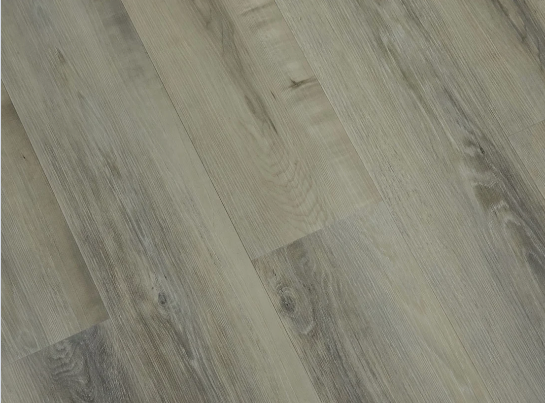 Floating Ice SPC vinyl flooring, angled close-up of the grain and plank joints.