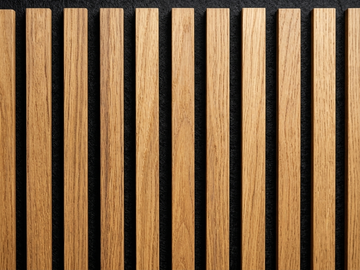 Vintage wood slat acoustic panels, close-up of the grain and dark gaps between slats.