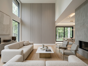 Piano white wood slat acoustic panels installed on a modern feature wall