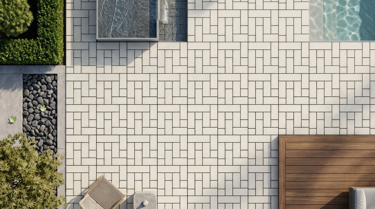 Four interlocking composite deck tiles in contrasting colours